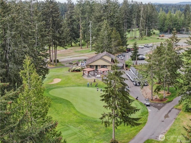 drone / aerial view with a view of trees