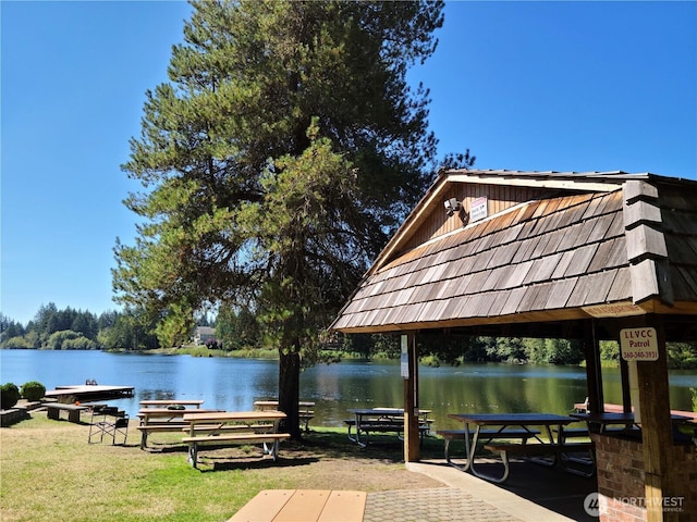 exterior space with a water view