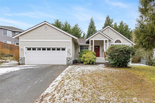 view of front of property with a garage