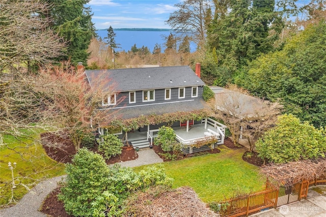 birds eye view of property featuring a water view