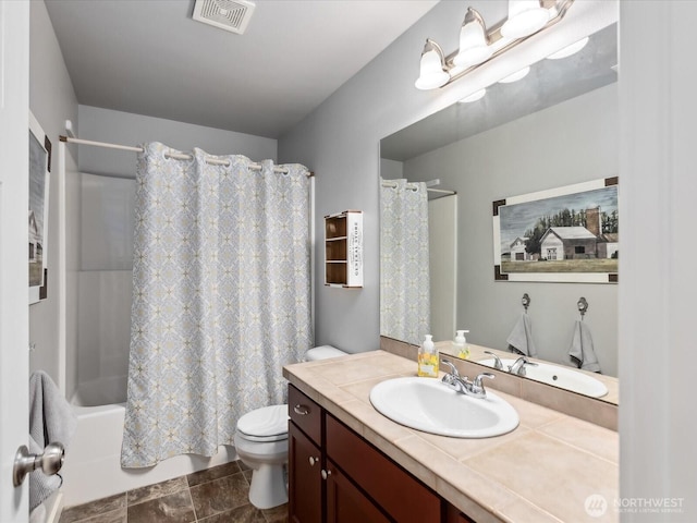 full bath featuring toilet, vanity, shower / bath combo with shower curtain, and visible vents