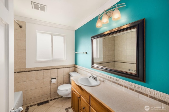 full bath with tile patterned flooring, visible vents, tile walls, and toilet