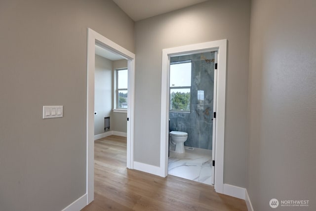 hallway featuring light hardwood / wood-style floors