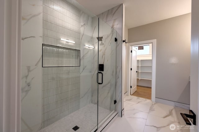 bathroom with an enclosed shower