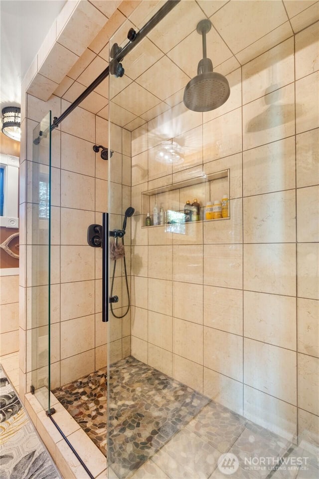 bathroom with a stall shower