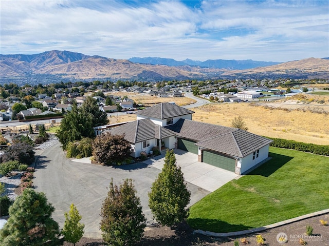 bird's eye view with a mountain view