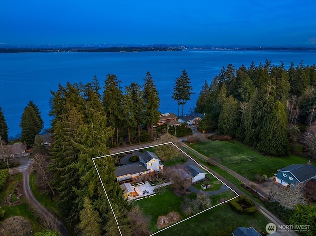 birds eye view of property featuring a water view