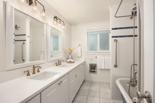 bathroom with vanity, heating unit, and tile patterned floors