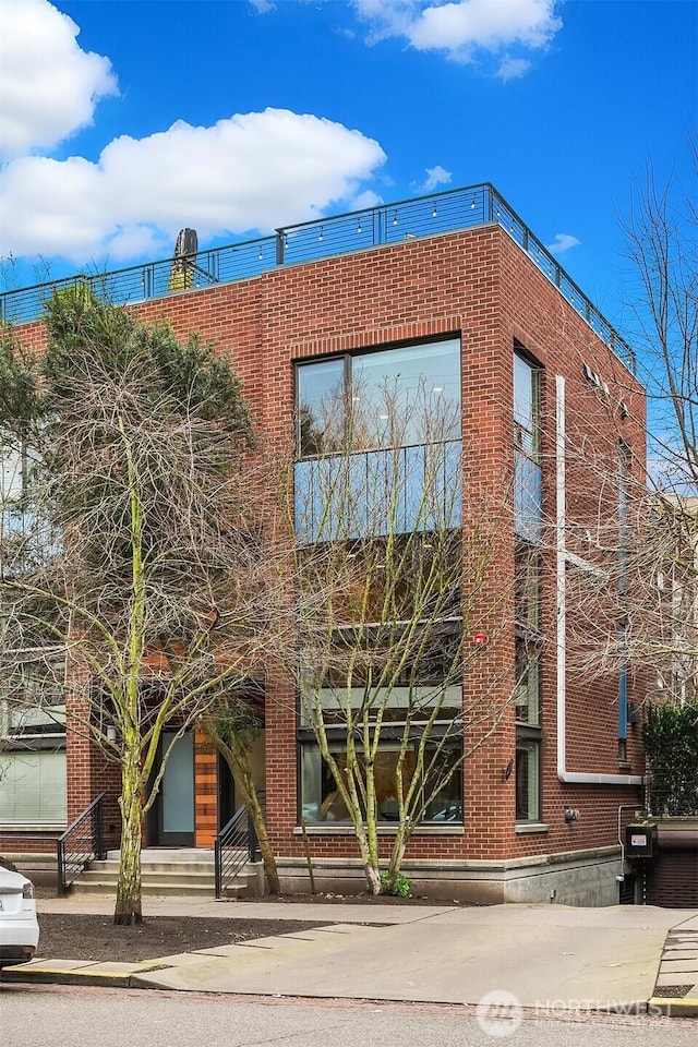 view of building exterior featuring entry steps