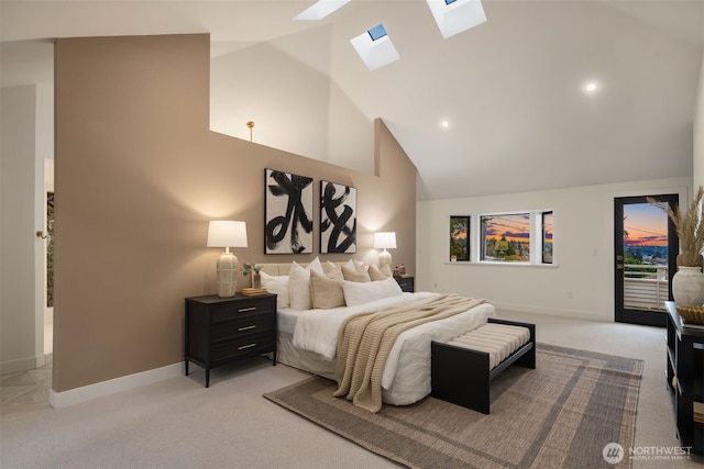 bedroom featuring light carpet, high vaulted ceiling, a skylight, and access to exterior