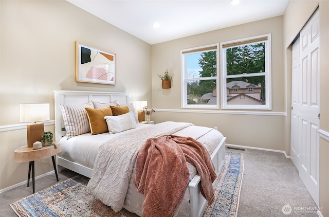 bedroom featuring dark colored carpet