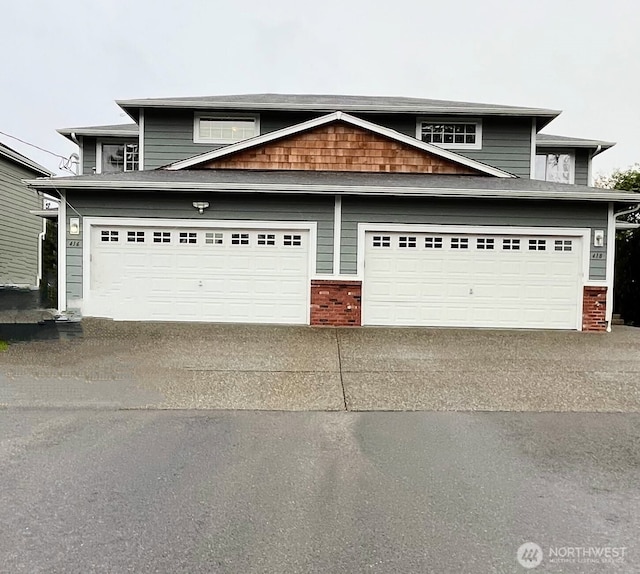 view of front of home with a garage