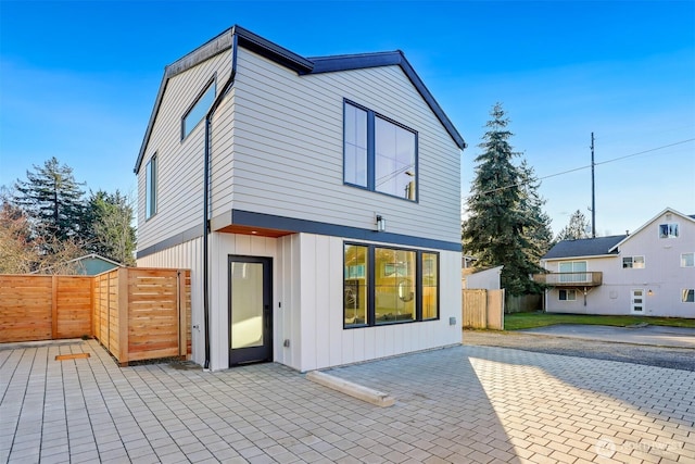 rear view of property with a patio area