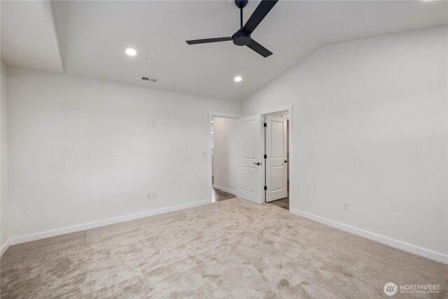 spare room featuring a ceiling fan, baseboards, lofted ceiling, recessed lighting, and carpet flooring