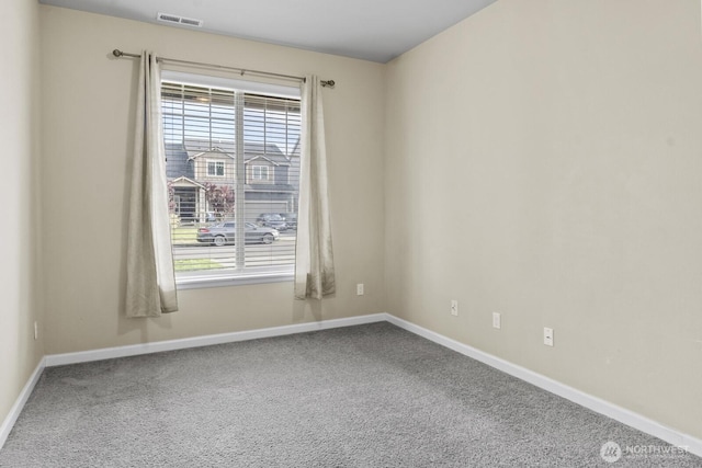 14426 99th Ave SE, Yelm, WA 98597 - empty room featuring carpet and baseboards
