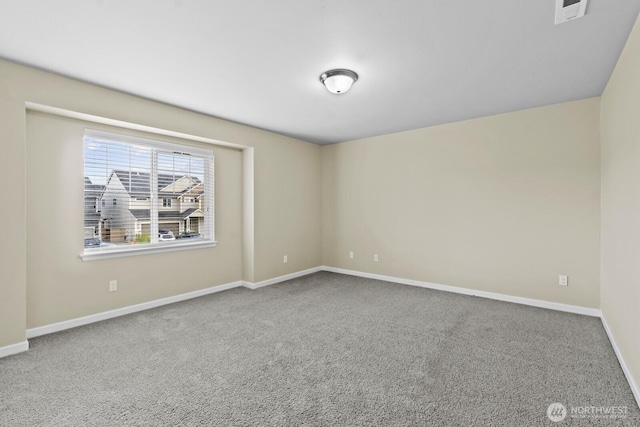 14426 99th Ave SE, Yelm, WA 98597 - carpeted empty room with baseboards