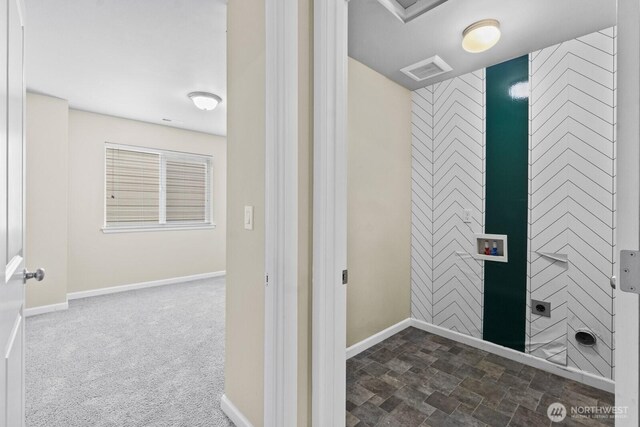 14426 99th Ave SE, Yelm, WA 98597 - bathroom with baseboards and stone finish floors