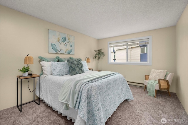 bedroom with a textured ceiling, carpet floors, and a baseboard radiator