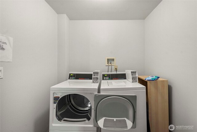 laundry area featuring independent washer and dryer