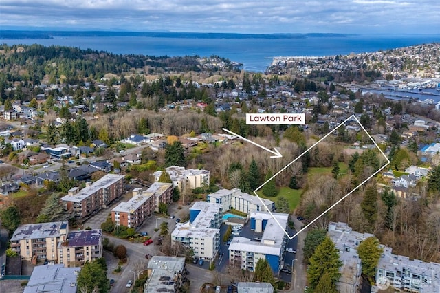 birds eye view of property featuring a water view