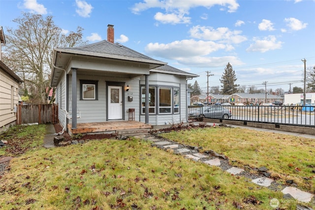 view of front of property with a front lawn