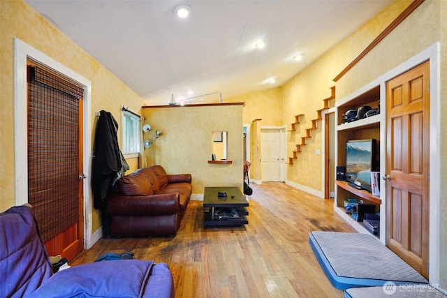 3416 Claremont Ave S, Seattle, WA 98144 - living room featuring vaulted ceiling, stairway, recessed lighting, baseboards, and hardwood / wood-style flooring