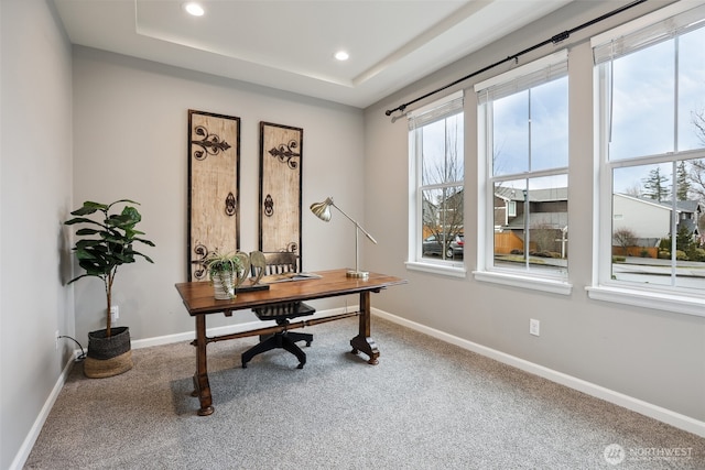 home office featuring carpet, baseboards, a raised ceiling, and recessed lighting