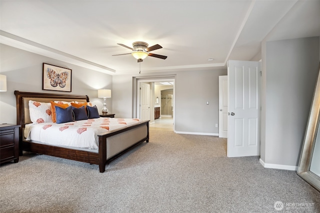 bedroom with ceiling fan, carpet floors, and baseboards