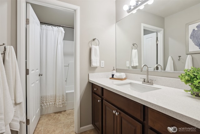 full bath featuring tile patterned floors and vanity