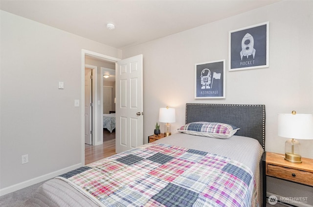 bedroom featuring baseboards