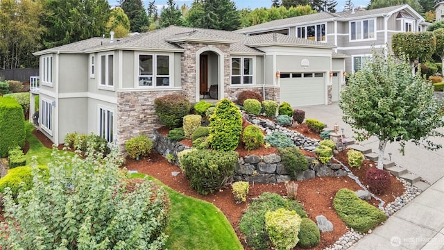 view of front of property with a garage