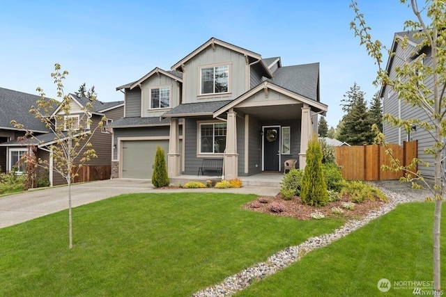 craftsman-style home with a front lawn and a garage