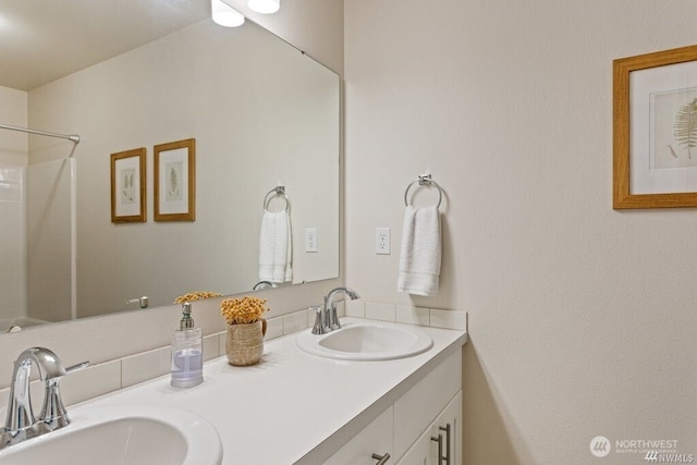 bathroom with vanity and walk in shower