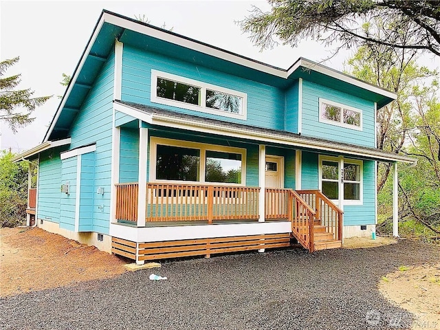 view of front of house featuring crawl space and covered porch