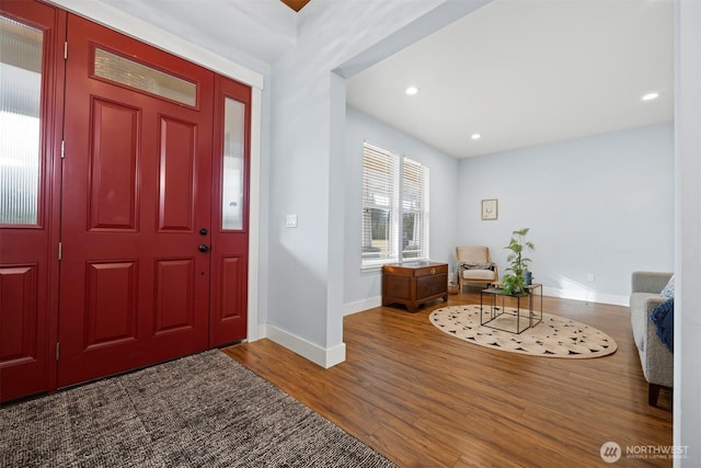 foyer entrance featuring recessed lighting, baseboards, and wood finished floors