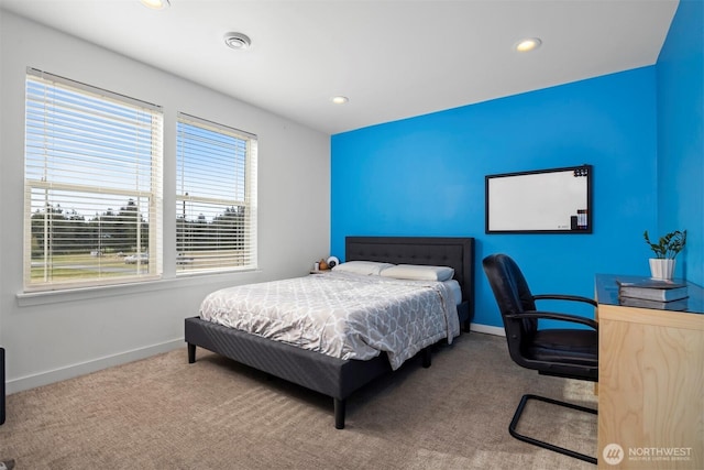 carpeted bedroom featuring recessed lighting and baseboards