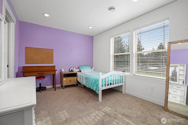 bedroom with recessed lighting, light colored carpet, visible vents, and baseboards