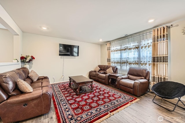 living room with hardwood / wood-style flooring