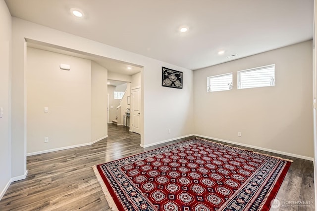 empty room featuring hardwood / wood-style flooring