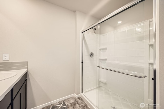 bathroom featuring vanity and walk in shower