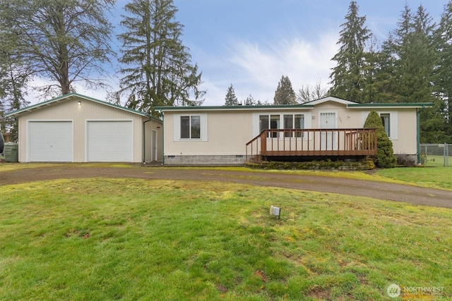 view of front facade featuring a garage, a wooden deck, crawl space, an outdoor structure, and a front yard