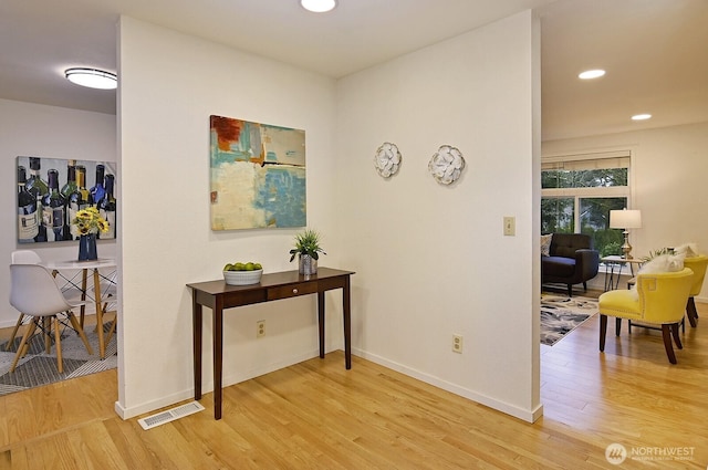 hall featuring wood-type flooring