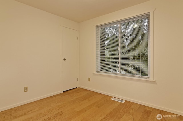 empty room featuring light wood-type flooring