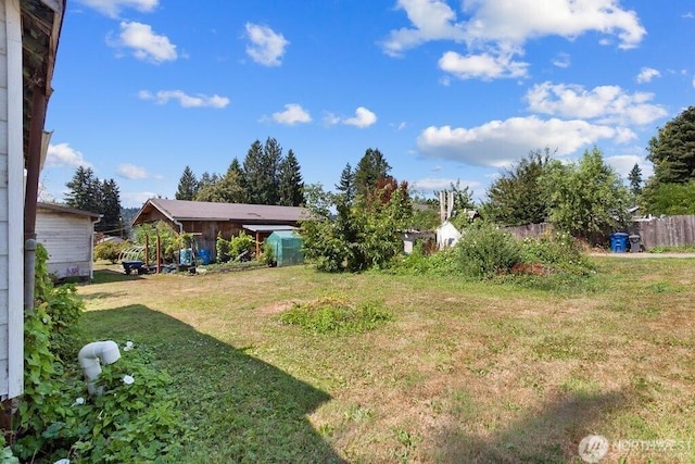 view of yard featuring fence