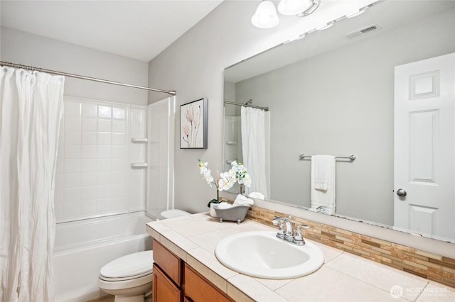 full bathroom featuring toilet, shower / bath combo, and vanity