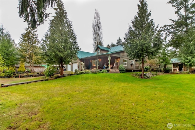 view of yard with a garage