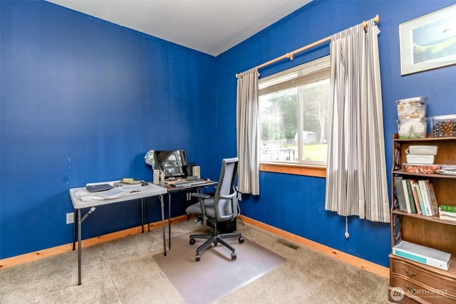 home office with visible vents, carpet, and baseboards
