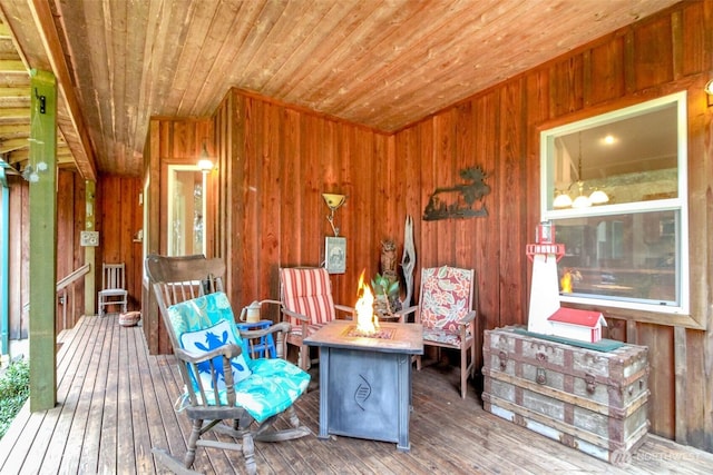 deck with an outdoor fire pit