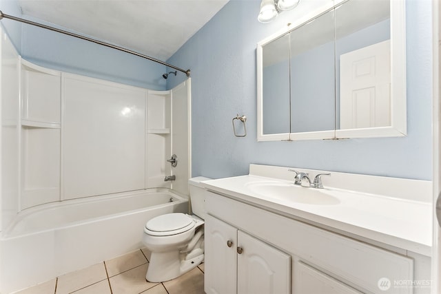 bathroom featuring toilet, vanity, shower / washtub combination, and tile patterned floors