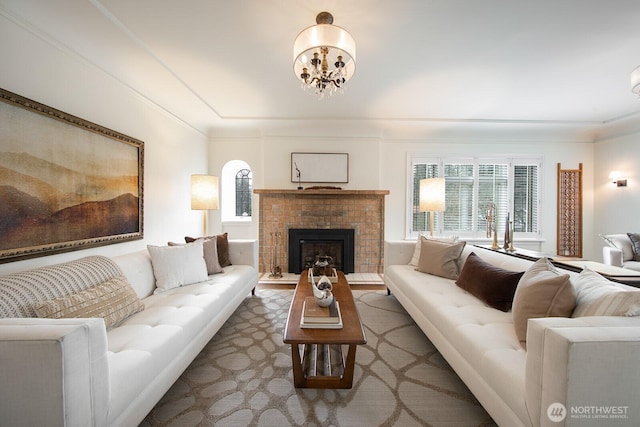 living room with a healthy amount of sunlight and crown molding